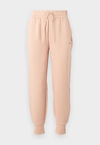 Light pink sweatpants with an elastic waistband and adjustable drawstring, featuring tapered cuffs and side pockets, made from soft fabric.