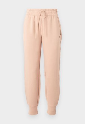 Világos rózsaszín melegítőnadrág, rugalmas derékrésszel és állítható zsinórral, szűkített szárakkal és oldalsó zsebekkel, puha anyagból készült.