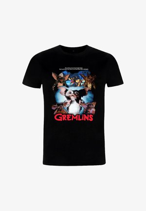 Zwarte katoenen t-shirt met een grafische print van Gremlins-personages en tekst, met een kleurrijk ontwerp en vet rood lettertype.