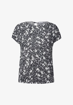 Top de manga corta en un patrón abstracto en blanco y negro, con escote redondo y un pequeño ojal en la parte posterior, hecho de tela ligera.
