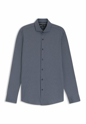 Napapaita sinisessä merivedessä hienovaraisella geometrisella kuviolla. Pitkät hihat, klassinen kaulus ja tummat napit. Sileä kangas.