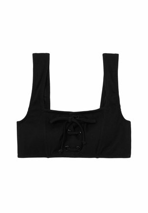 Haut court noir à côtes avec des bretelles larges et un détail avant à lacets avec œillets en métal.