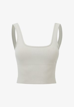Top scurt bej deschis fără cusături, cu bretele late și decolteu pătrat, realizat din material elastic cu caneluri.