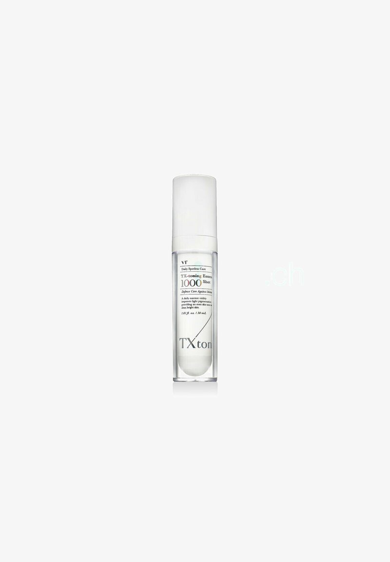 Flacon en plastique transparent de VT Daily Spotless Care TX Toning Essence 1000 Shot avec bouchon blanc et texte noir, volume 30 ml.