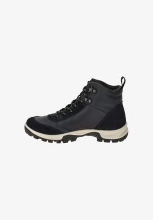 Black and gray hiking boot with thick white sole, black and white laces, metal eyelets, and pull tab on the ankle collar, side view.