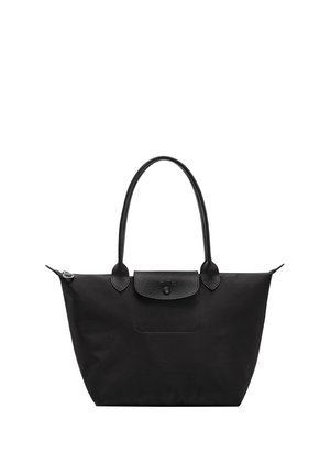 Black tote bag with two shoulder straps, a top zipper, and a front flap pocket with a button closure.