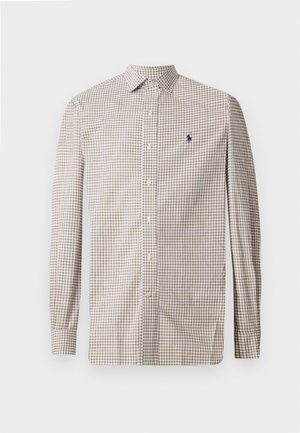 Long-sleeve button-up shirt with beige and brown check pattern and small embroidered navy logo on the left chest.