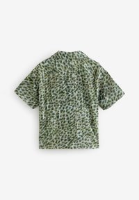 Lühikeste varrukatega särk helerohelisest kangast, millel on tuhmid tumerohelised abstraktsed mustrid. Lõdvestunud lõige koos kampsuni kraega.