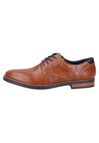 Scarpa in pelle marrone con punta tondeggiante, lacci blu e dettagli. Presenta un interno in pelle nera a contrasto e suola testurizzata.