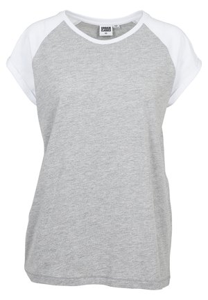 Pilkas marškinėliai su baltais raglan šešėliais, apvaliu kaklu, laisvu kirpimu, pagaminti iš minkštos, lengvos medžiagos, su lygiu paviršiumi.