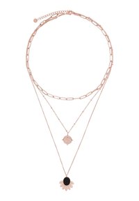 Collier superposé en or rose présentant un design en maillons, un pendentif rond avec des détails complexes et un pendentif en forme de fleur avec un centre noir.