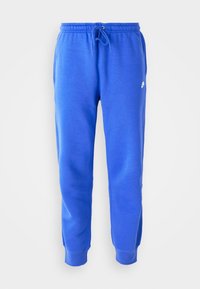 Blue sweatpants made of soft fabric, featuring an elastic waistband, drawstring, and cuffed ankles. Small logo detail on the thigh.