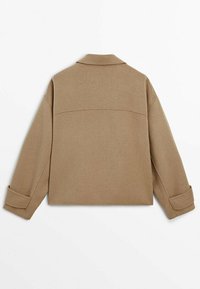 Brown wool-blend jacket with a structured silhouette, wide collar, and oversized sleeves. Features buttoned cuffs and clean finishing.