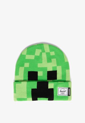 Zielona pikselowa dzianinowa czapka z czarnymi kwadratowymi oczami i ustami, przypominająca postać Creepera z Minecraft, z metkami Herschel i Minecraft.