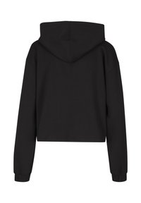 Haut à capuche noir court avec une poche kangourou à l'avant, des manches longues, des poignets côtelés et une capuche à cordon. Matière en coton lisse.