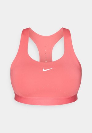 Sporta krūšturis spilgtā korāļu krāsā, izgatavots no gludas auduma. Tam ir racerslāņa dizains, mazi caurumi elpošanai un balts logo priekšpusē.