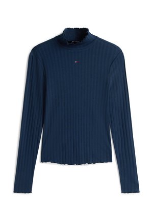 Top a maniche lunghe in blu navy a costine con un alto colletto arricciato e un piccolo dettaglio logo sul petto. Tessuto morbido con design corto.