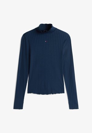 Tengerészkék bordázott hosszú ujjú felső magas fodros gallérral és kis logóval a mellkastájékon. Puha textúrájú, rövidített fazonú.