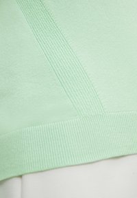 comma Sweter