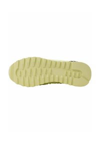 Sole of a lime green shoe with a textured, ridged pattern for grip, featuring a smooth front and a rounded toe.