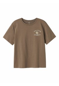 Brown cotton t-shirt with short sleeves and round neckline. Features white text "Have a nice day" with graphic design. Smooth texture.