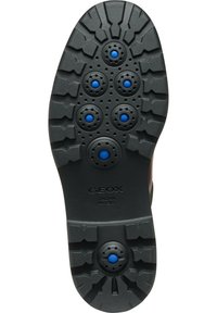 Suola in gomma nera con una superficie texturizzata, caratterizzata da accenti circolari blu e un motivo di battistrada per la presa; contrassegnata con "GEOX ITALIAN PATENT."