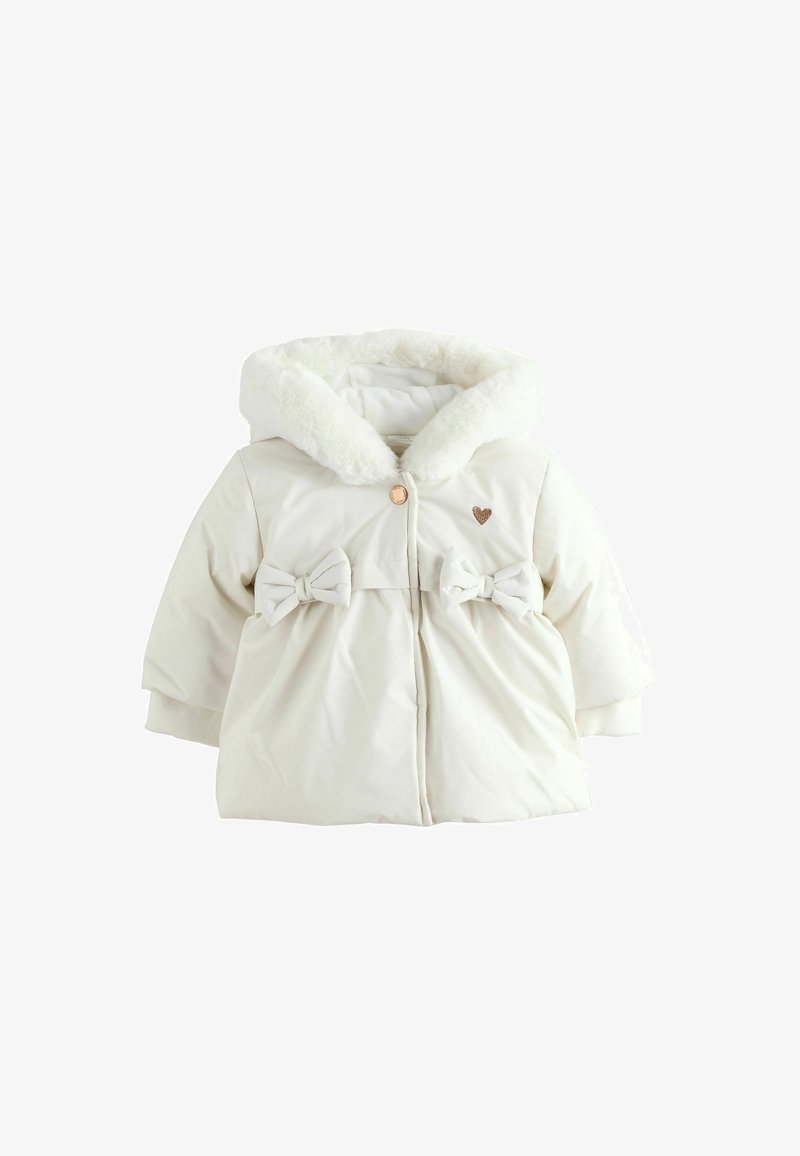 Veste d’hiver bébé couleur crème avec capuche en fausse fourrure, nœuds à l’avant, manches longues et petit détail cœur sur la poitrine.