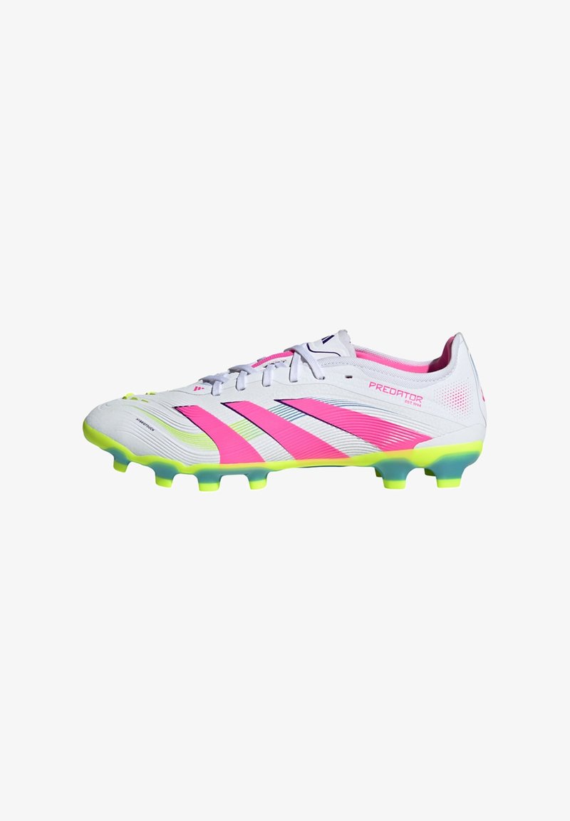 White athletic soccer cleat with pink and yellow accents, a textured upper, and multiple molded studs for traction. Features a lace closure.