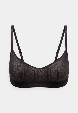 Sort mesh bralette med et geometrisk mønster, justerbare stropper og et mærket elastisk bånd med "Calvin Klein" i et diskret tryk.