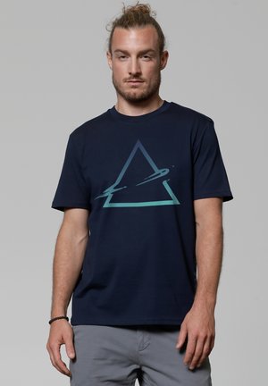 Navy blue t-shirt made of cotton with short sleeves, featuring a triangular graphic in light blue and green tones at the center.