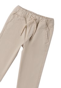 Pantaloni beige con elastico in vita, dotati di cordoncino, tasche laterali e una texture di tessuto liscia. Vestibilità rilassata con linee pulite.