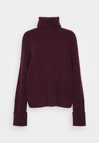 Bordeaux polotröja i texturerat stickat material. Har lösa ärmar med vikta manschetter och en avslappnad passform.