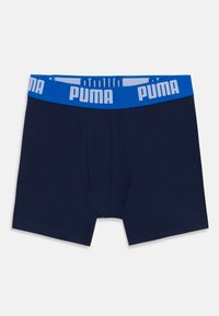 Marineblaue Boxershorts aus weicher Baumwolle. Mit einem blauen elastischen Bund und weißem "PUMA"-Logo. Glatte Textur, normale Passform.