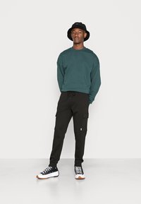 Jack & Jones JPSTGORDON JJSHARK   - Pantalones deportivos - black