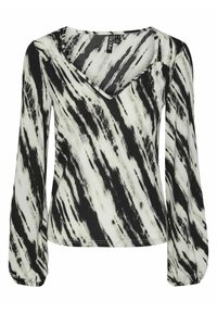 Svart och vit mönstrad långärmad topp. Har en V-hals, texturerad tyg och lösa ärmar med elastiska ärmslut. Modern abstrakt design.