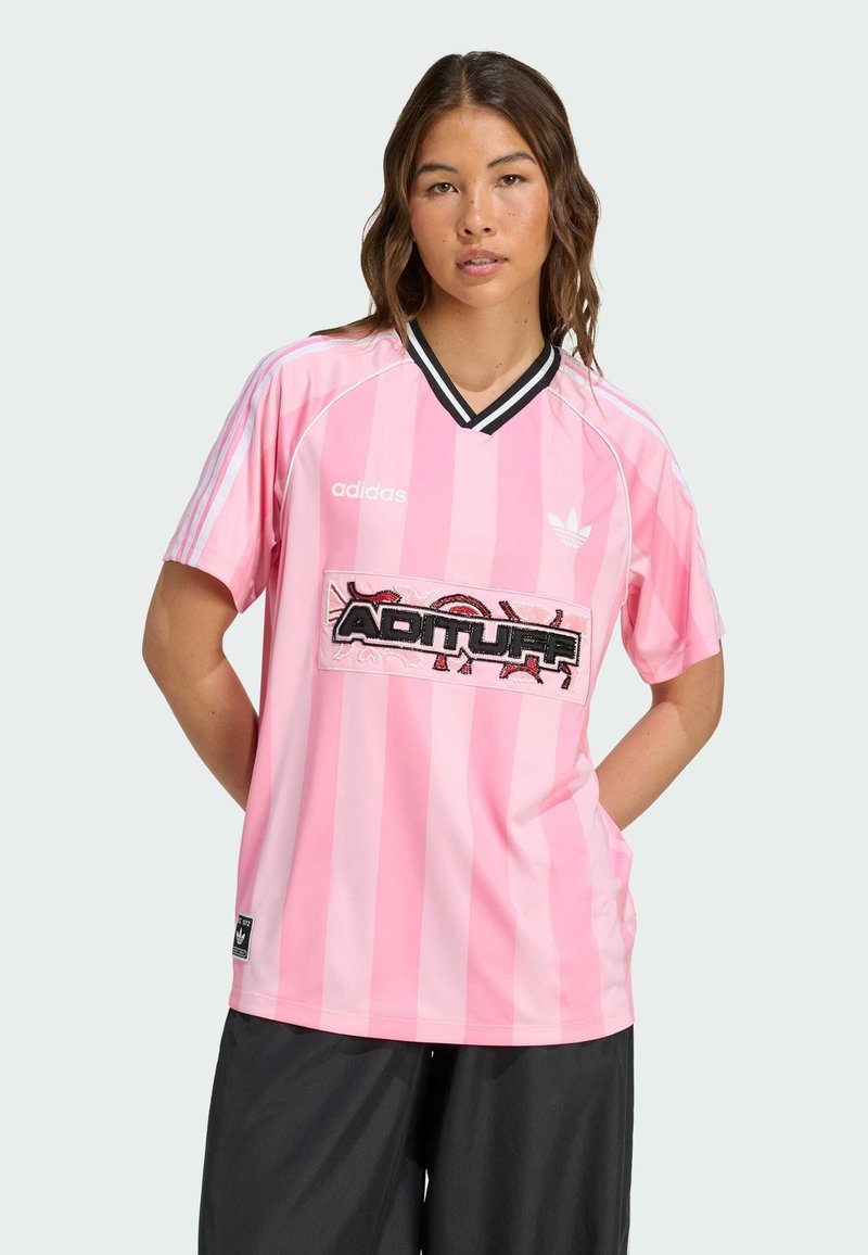 Pink striped soccer jersey with black accents, featuring an embroidered "ADITUFF" logo and Adidas branding. Made from breathable fabric.