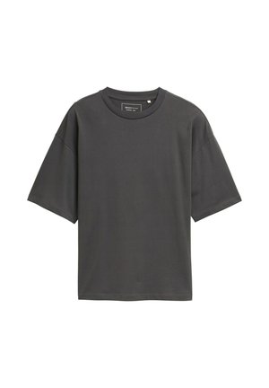 Dark gray oversized t-shirt made of smooth cotton. Features a round neckline, short sleeves, and a simple, unembellished design.