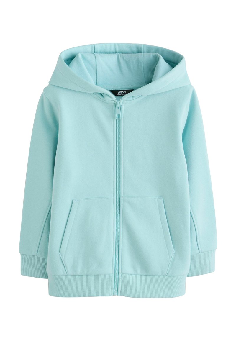 Felpa con zip di colore verde menta, dotata di tasca a marsupio, polsini e orlo a coste. Realizzata in un tessuto morbido e confortevole, con una vestibilità leggera e rilassata.