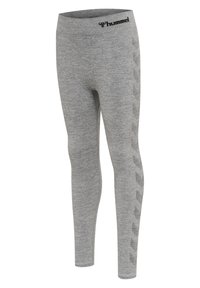 Grå leggings med ribbad struktur, med en logotyp vid midjan och ett mönstrat sidoflik. Tillverkad av stretchig, ventilerande tyg.