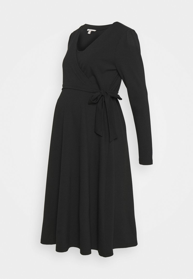 Vestido de maternidad negro con manga larga, escote en V y lazo en la cintura. Hecho de una tela suave, con una falda fluida para mayor comodidad.