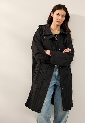 SHOWER RESISTANT  - Parka - black