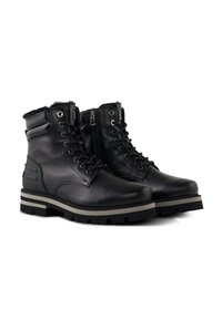 Sorte læderstøvler med polstret krave, snørelukning foran og lynlås i siden. Har en robust sål med en grå stribe og logodetalje.