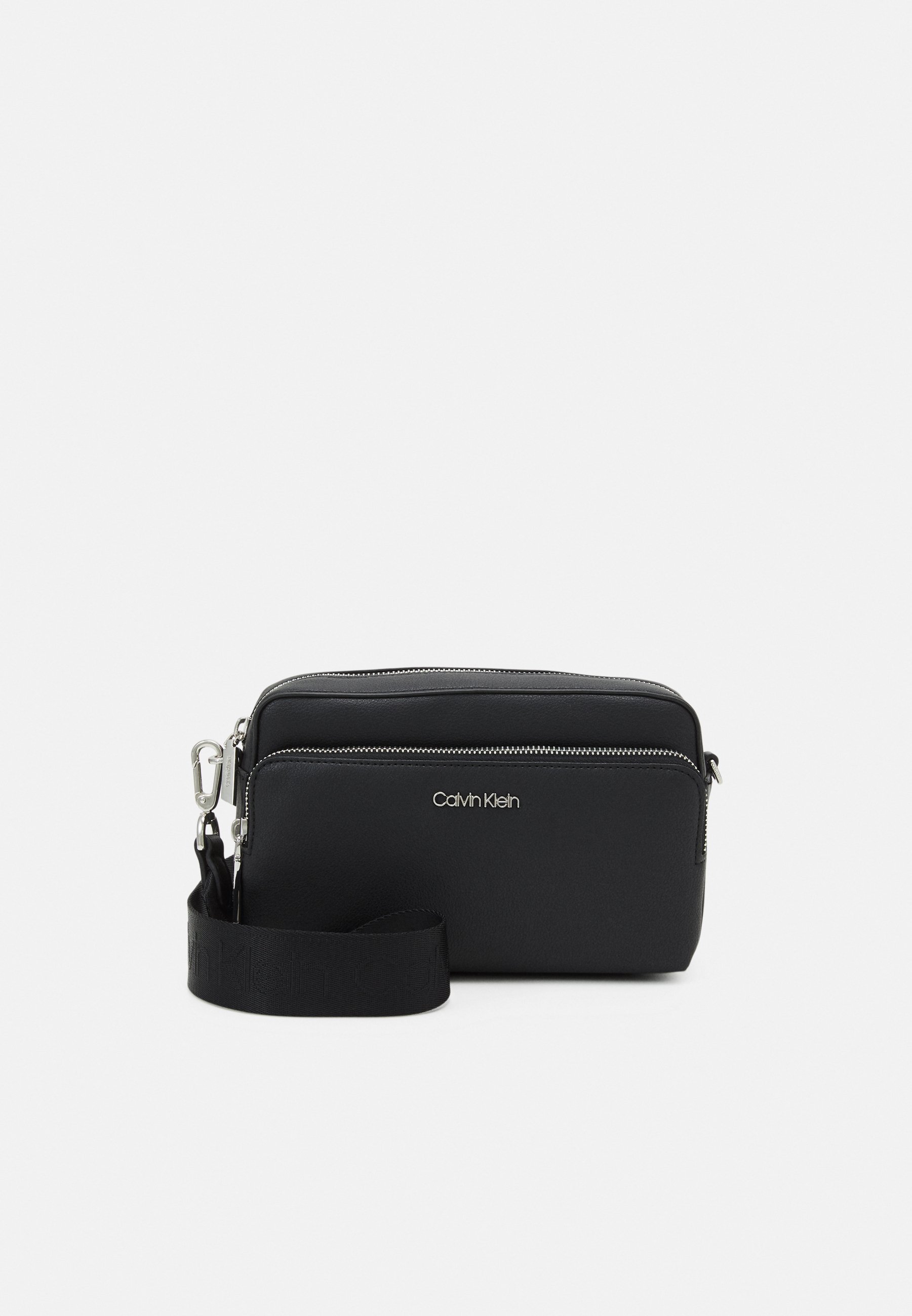 Calvin Klein MUST CAMERA BAG UNISEX - Across body bag - black