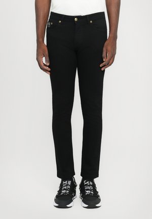 NARROW DUNDEE - Skinny-Farkut - black