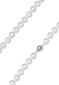 Pearl necklace featuring round, white pearls with a smooth surface, secured by a silver magnetic clasp. Evenly spaced and shiny.