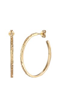 Goldene Creolen mit gehämmertem Finish, dünnem Profil und sicherem Steckverschluss. Glatte Oberfläche und leichtes Design.