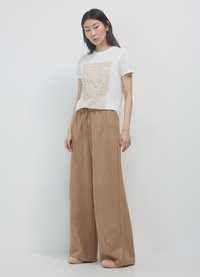 Calliope JOGGER EFFETTO  - Jogginghose - biscotto