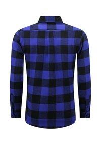 Langarmige geruite blouse in blauw en zwart. Kenmerkt zich door een kraag, knoopmanchetten en een rechte zoom met een gestructureerd stofpatroon.