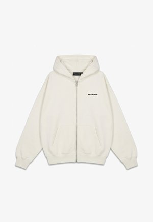 Světlý béžový mikina na zip s předními kapsami, kapucí, žebrovanými manžetami a logem "PEGADOR" na hrudi a uvnitř límce.