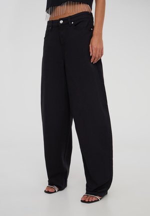 - Jeansy Relaxed Fit